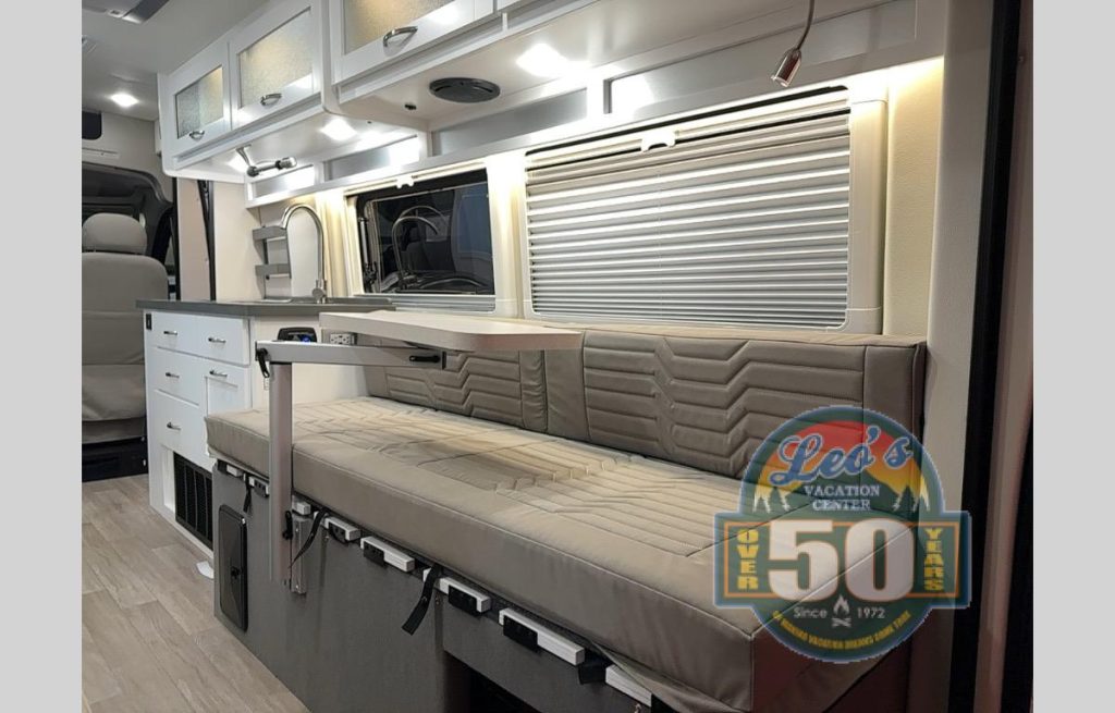 Coachmen RV Nova 20D class B motorhome sofa with a table